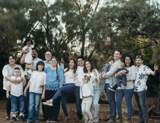 A family gathered together in a garden